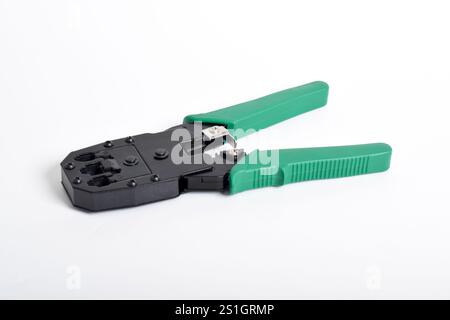 Crimping Tools isolated on white background. Crimping pliers. functions to cut cables and install RJ45 connectors with cables Stock Photo