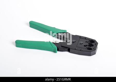 Crimping Tools isolated on white background. Crimping pliers. functions to cut cables and install RJ45 connectors with cables Stock Photo