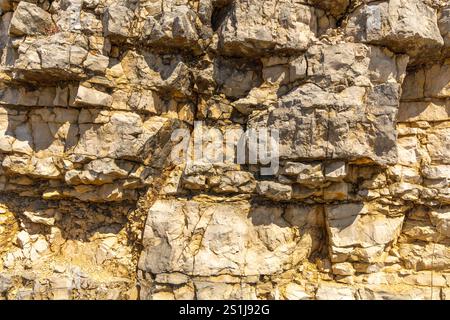 Pattern of stones textured granite surface varied rock details unique vein formations and marbleized granite reserve. Ourém Portugal Stock Photo