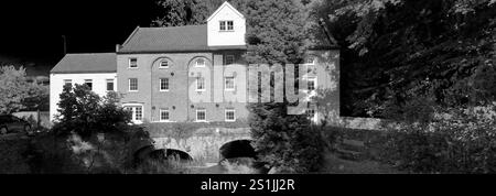 View of Narborough Mill, river Nar, Narborough village, North Norfolk, England, UK Stock Photo