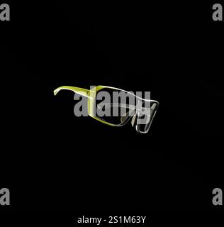 Bicycle goggles in light green and gray color on black background. Concept of safe bicycle riding. Stock Photo