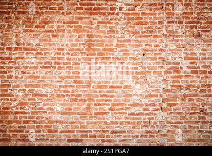 rustic a red brick wall texture, a timeless design element. The rough surface and warm hue .  used indoors or outdoors, the classic appeal of red bric Stock Photo