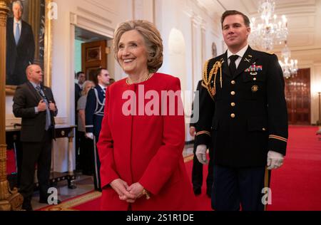 Washington, United States. 04th Jan, 2025. Former Secretary of State Hillary Clinton and 2024 Presidential Medal of Freedom recipient enters the East Room of the White House on Saturday January 4, 2025. The Presidential Medal of Freedom is the NationÕs highest civilian honor, presented to individuals who have made exemplary contributions to the prosperity, values, or security of the United States, world peace, or other significant societal, public or private endeavors. Photo by Leigh Vogel/Pool/Sipa USA Credit: Sipa USA/Alamy Live News Stock Photo