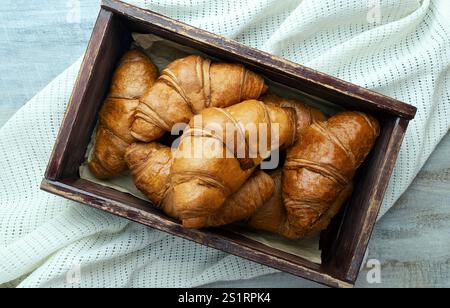 French cuisine, homemade bakery, breakfast, food, cooking and pastry concept. Morning with fresh croissants. fresh croissants on table, dessert. crois Stock Photo