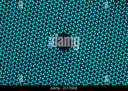 RGB Light Speaker Grill Cover Texture on Turquoise Background Stock Photo