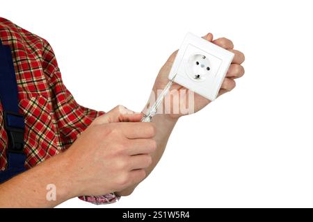 Hand of an electrician in detail with socket against a white background Stock Photo