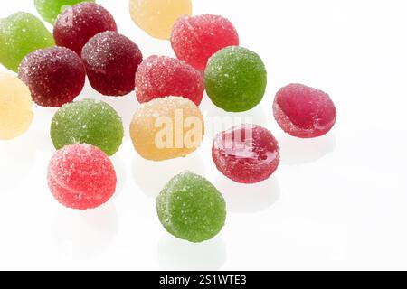 Colorful marmalade isolated on white background. Delicious jujube balls. Stock Photo