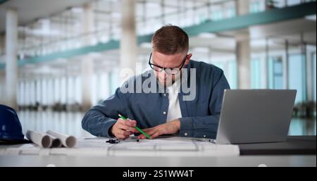 Civil Engineer Drawing Architecture Plan And Construction Design Stock Photo