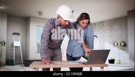 Home Construction Inspector And Interior Designer Contractor At Work Stock Photo