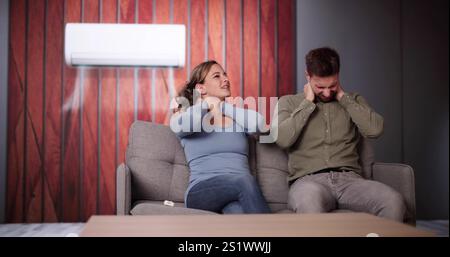 Sick Couple Having Cold And Sore Throat From Air Conditioner Stock Photo