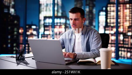 Contemplative Business Analyst With Laptop. Thoughtful Man Pondering Stock Photo
