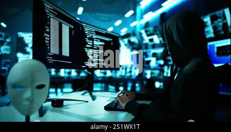 Hacker Stealing Data From Computer. Piracy And Fraud Stock Photo