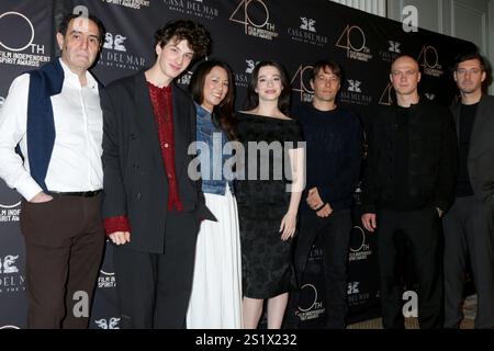 Mark Eydelshteyn, left, and Yura Borisov arrive at the Oscars on Sunday
