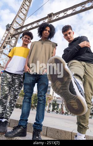 three teenagers looking at camera challenging Stock Photo