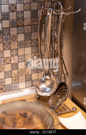 Close up shot of the metal kitchen utensils set Stock Photo
