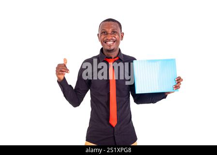 portrait of a handsome young businessman holding folder and showing his thumb while smiling. Stock Photo