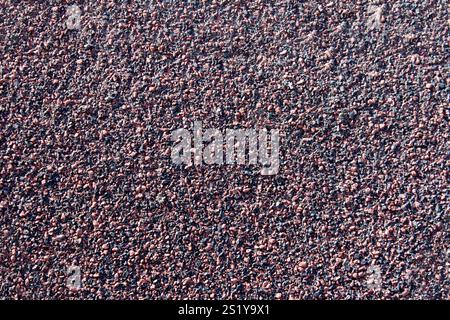 Gray and red honeycomb bitumen shingle close up as nice background Stock Photo