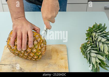 Pineapple contains bromelain, an enzyme that aids in digestion and has anti-inflammatory properties. Stock Photo