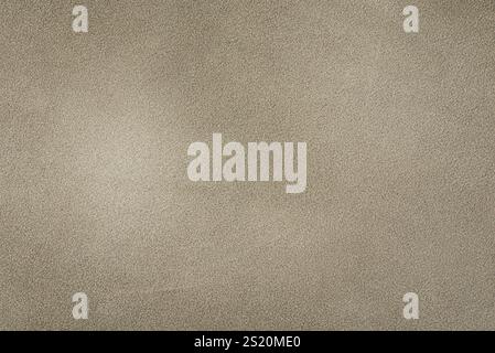 Beige suede as a background. Suede leather macro photo color beige light shadow Stock Photo
