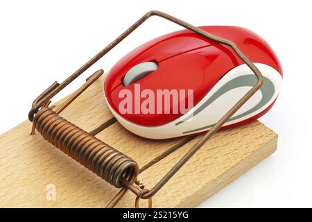 The mouse of a computer in a mousetrap. Symbolic photo for cost trap, debt trap and roaming charges. Austria Stock Photo