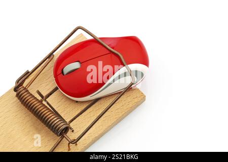 The mouse of a computer in a mousetrap. Symbolic photo for cost trap, debt trap and roaming charges. Austria Stock Photo