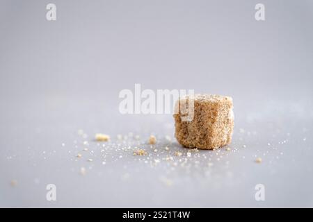 Brown sugar cubes on table Stock Photo