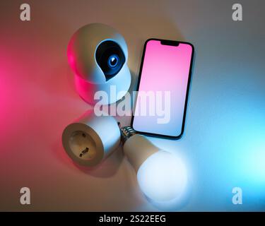 smart home devices remote control phone empty pastel screen mockup isolated background human hand Stock Photo