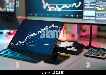 crypto currency finance analytics screen office space table computer displays fintech industry calculator Stock Photo