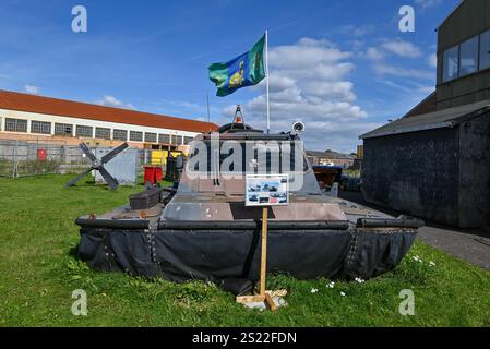 Military hovercraft with Royal Marine markings and flag on display at the Hovercraft museum.  September 2024. Stock Photo