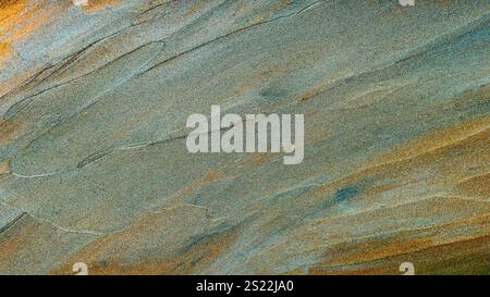 Abstract Green Background with Orange Shades and Stroke Of Shiny Paint Creating Dynamic Texture Stock Photo