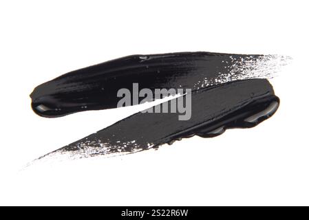 Black brush strokes isolated on white background. Paint by hand. Stock Photo