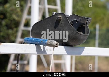 Handle and mask for welding with machine for electric arc welding on a construction site Stock Photo