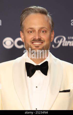 Nate Bargatze poses in the press room during the 82nd Golden Globes on