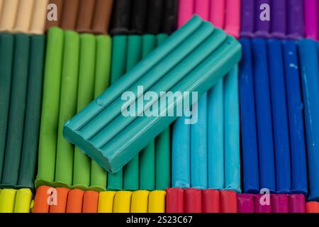 plasticine of different colors for modeling closeup, a simple colored plasticine that is used in creativity Stock Photo