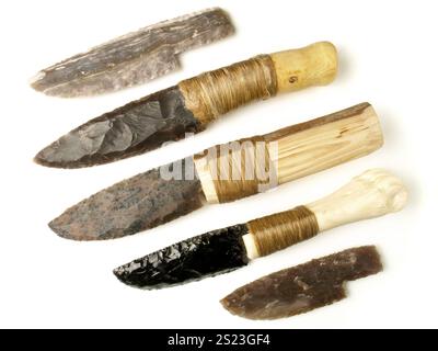 Stone Age Knives with Flintstone and Obsidian Blade isolated on white Background Stock Photo