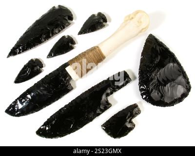 Stone Age Knife with Bone Handle and Obsidian Blade isolated on white Background Stock Photo