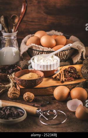 Assorted baking ingredients and kitchen utensils in brown tone Stock Photo