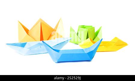 Group origami figure of boats (isolated on white) Stock Photo