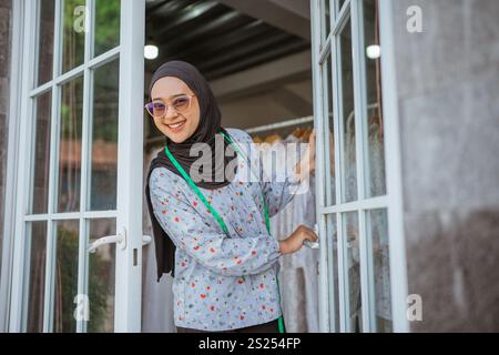 A Fashionable Young Woman, Dressed in Beautiful Traditional Attire, Posing Outdoors Stock Photo