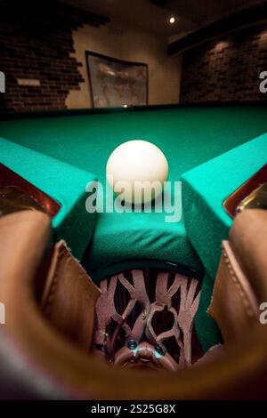 white ball in billiard pocket Stock Photo