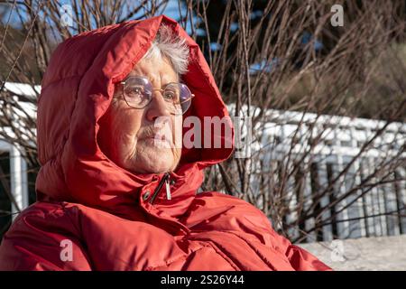 Portrait of a senior woman wearing a winter coat Stock Photo