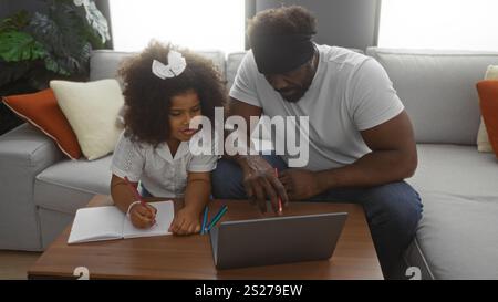 Father and daughter in living room involved in educational activity on a laptop, showcasing a warm, loving family moment with the girl taking notes. Stock Photo