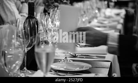 served table at the beginning of an official dinner in restaurant Stock Photo