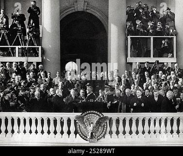 U.S. President Franklin D. Roosevelt taking oath of office from Chief Justice Charles Evan Hughes at his third inaugural ceremony, Washington, D.C., USA, Franklin D. Roosevelt Presidential Library & Museum, January 20, 1941 Stock Photo