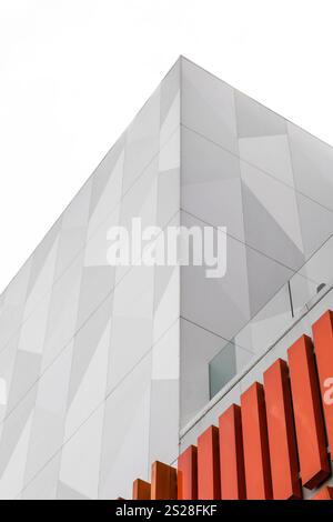 A silver wall with a geometric square pattern. The sleek, metallic finish gives the design a contemporary look, while the square shapes add structure Stock Photo
