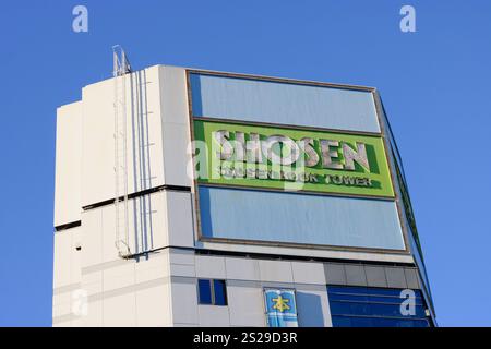 TOKYO, JAPAN - January 3, 2023: A sign on the top of Shosen Book Tower in Tokyo's Akihabara area. Stock Photo