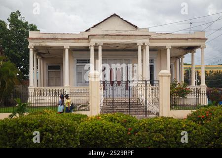 The typical colonial ornate buildings with corinthian columns in ...