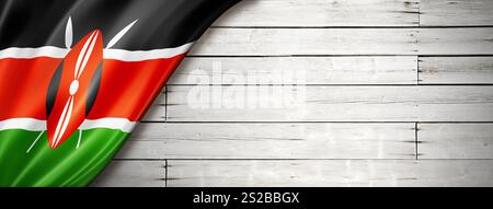 Kenya flag on old white wall. Horizontal panoramic banner. Stock Photo