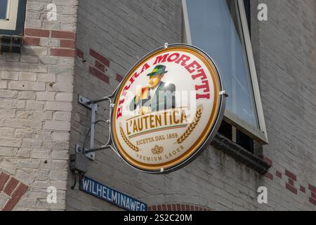 Woerden , the Netherlands. 9 July 2024. Birra Moretti beer Flag sign logo. Birra Moretti was an Italian brewing company, founded in Udine in 1859 by L Stock Photo