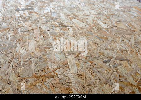 Close-up of OSB Board Texture: Abstract Wooden Particleboard Surface Stock Photo